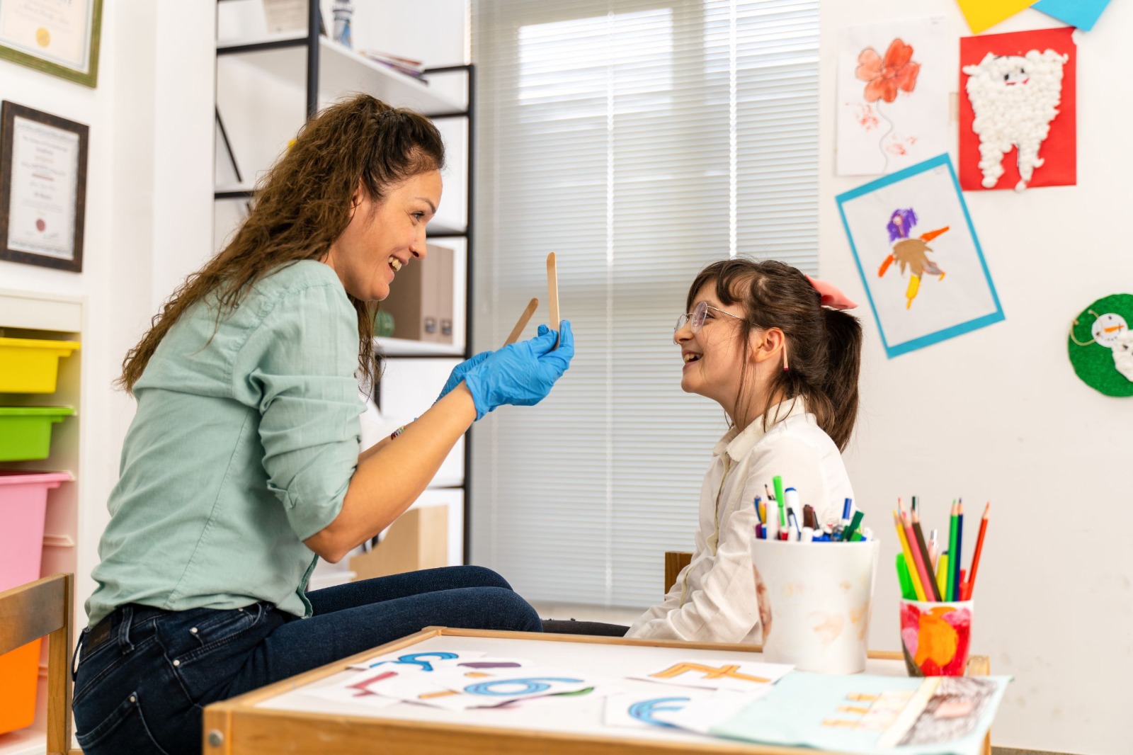 Therapist working with a child